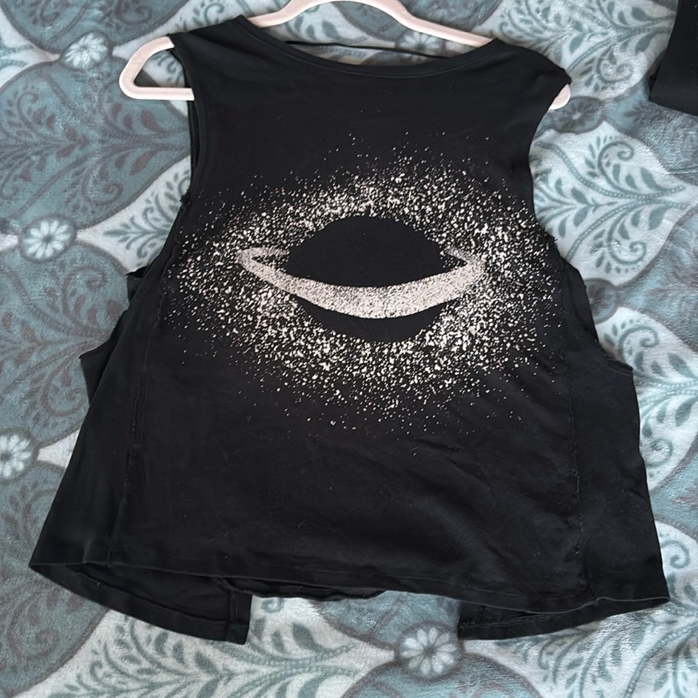 Used XS Free People, black tank top, with a graphic Saturn